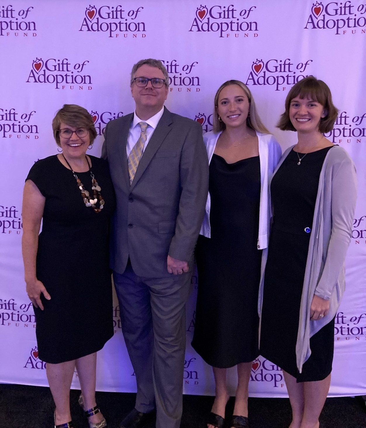Anne Gross (Lead, Data Citizens with Purpose), Brian Murphy (COO, Gift of Adoption Fund), Elise Adreon (Advisory Associate), Rachel Gatto (Advisory Manager) meet for the first time at Gather for the Gift.